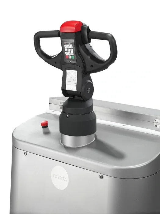 BT Levio LPE200I powered pallet truck, electric low-lifter with platform. Details photo taken of steering arm and handle. 