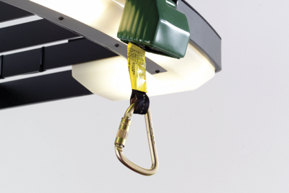 Close-up of retractable tether mounted in forklift overhead guard.