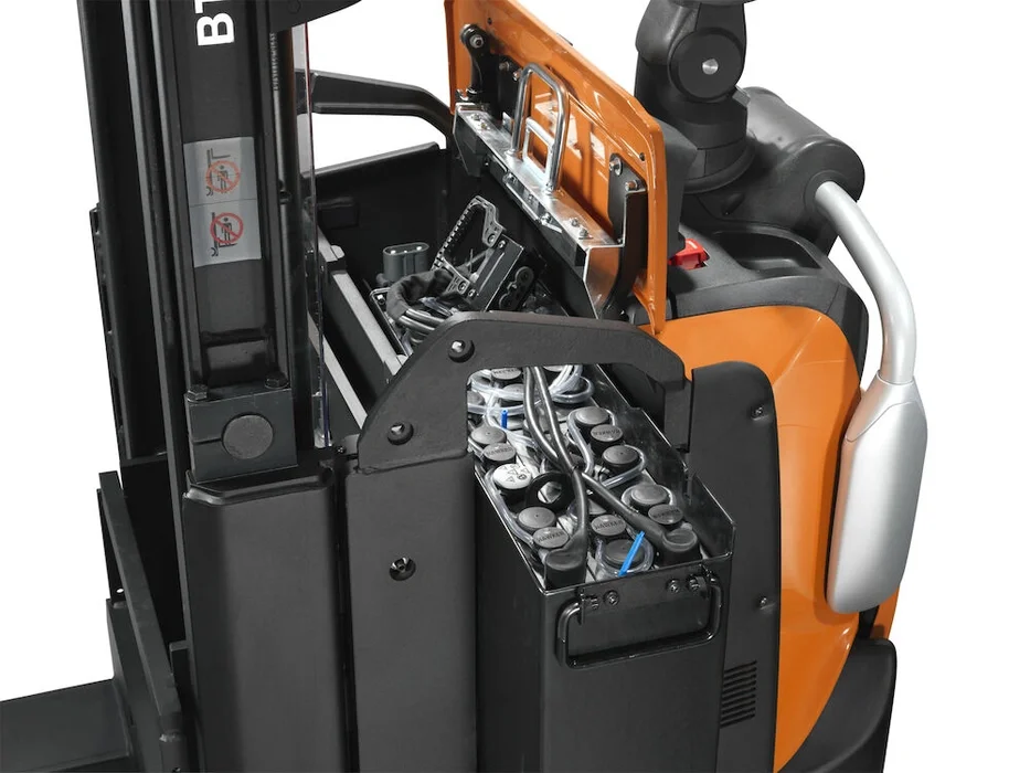 BT Staxio SPE200D, electric stacker with platform and side guards. Details photo of sideways battery change. 