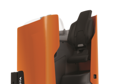 Product photo close-up of operator compartment and chair.