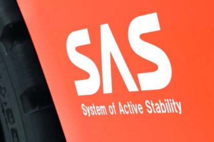 Close-up of SAS logotype printed on the side of a forklift. 