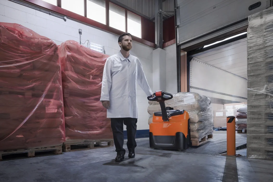 BT Levio LWI160 powered pallet truck, electric walkie low-lifter. Application photo in loading bay.