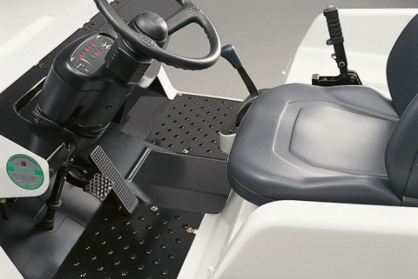 Product photo close-up of towing tractor driver compartment. 