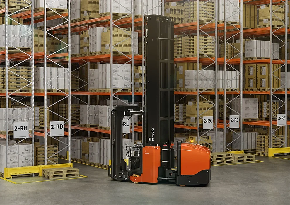 BT Vector VCE150A, man up, very narrow aisle truck. Application photo in warehouse environment.